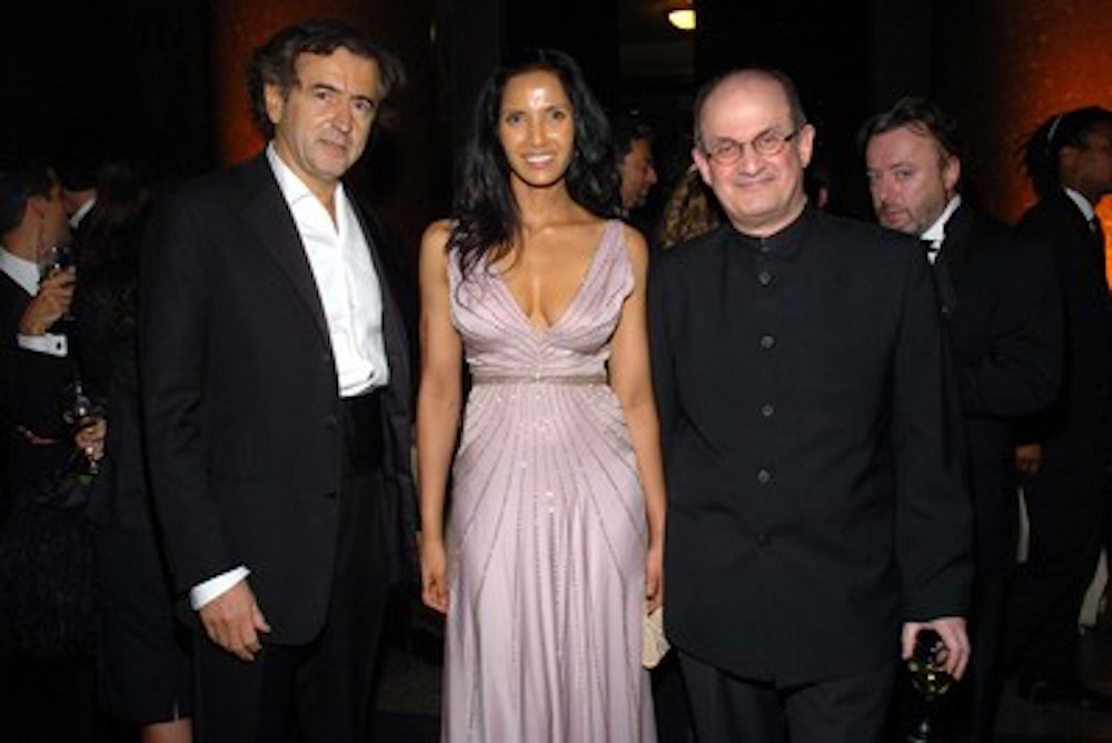 Bernard-Henry Levy, Padma Lakshmi Rushdie and Salman Rushdie at the Pen Montblanc Literary Gala, American Museum of Natural History, New York, April 20, 2005.