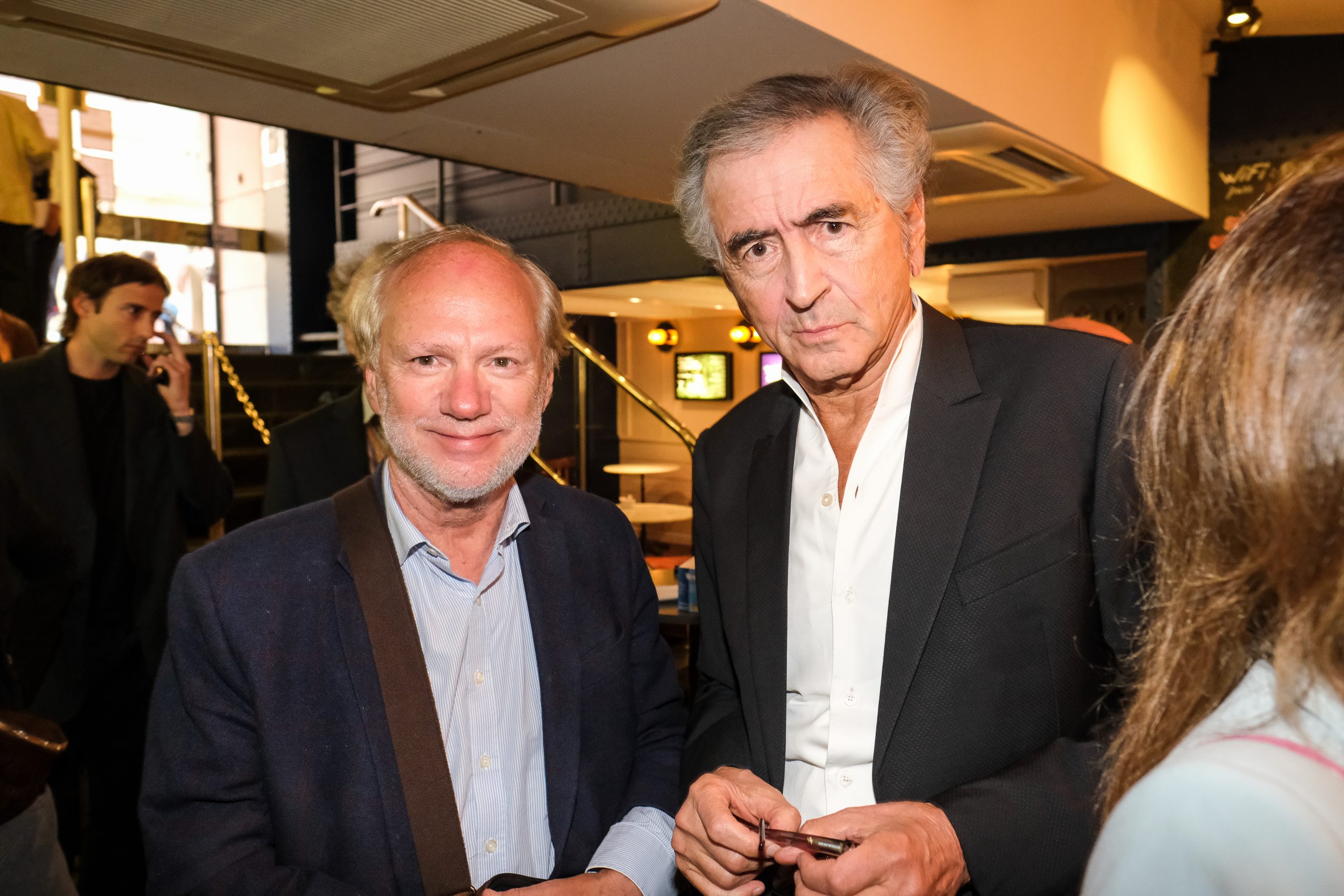 Bernard-Henri Lévy and Laurent Joffrin, during the preview of BHL's film "Why Ukraine", at the Cinema Le Balzac in Paris.