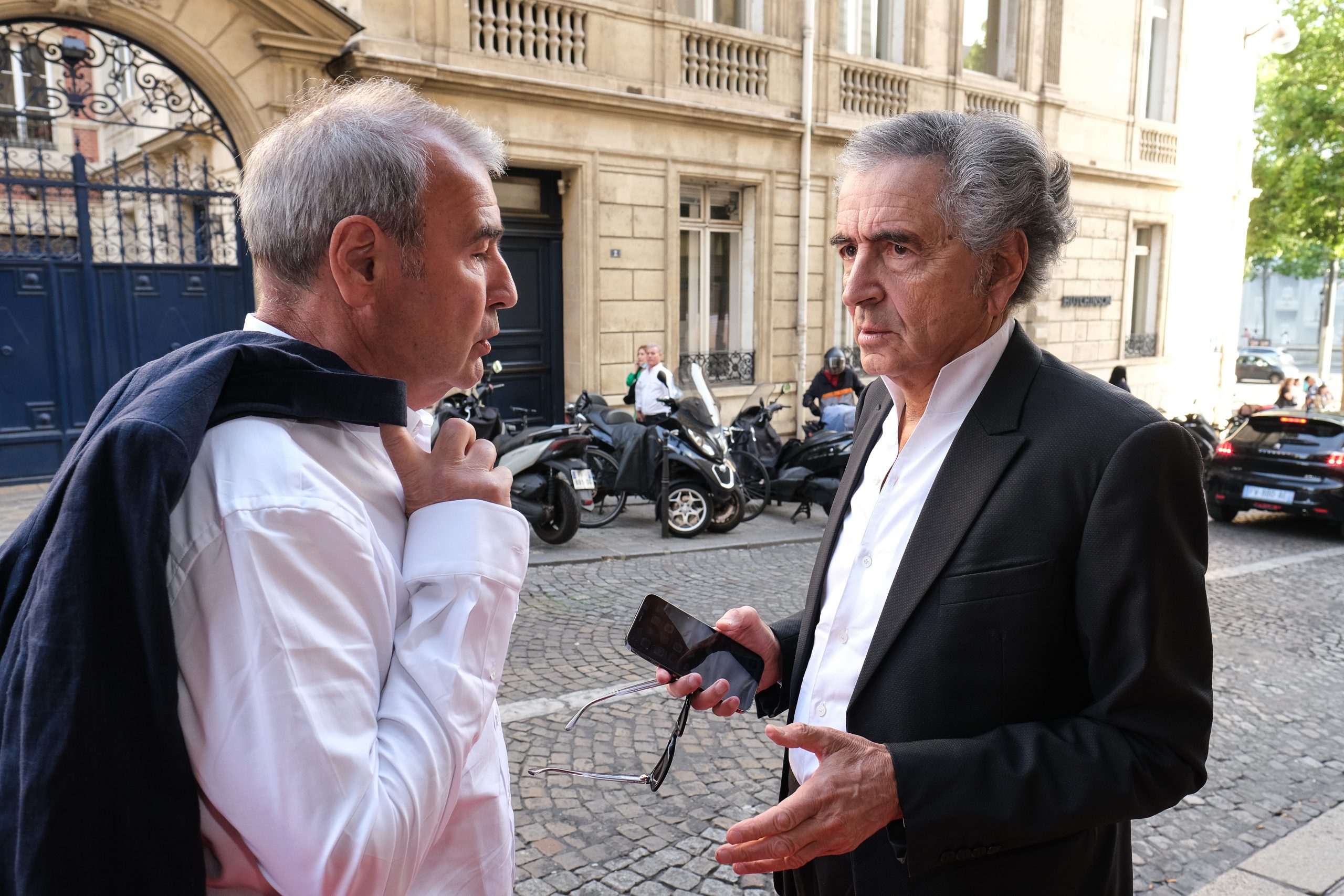 Marc Roussel and Bernard-Henri Lévy in front of the Cinema Le Balzac in Paris, before the screening of their film: "Why Ukraine".